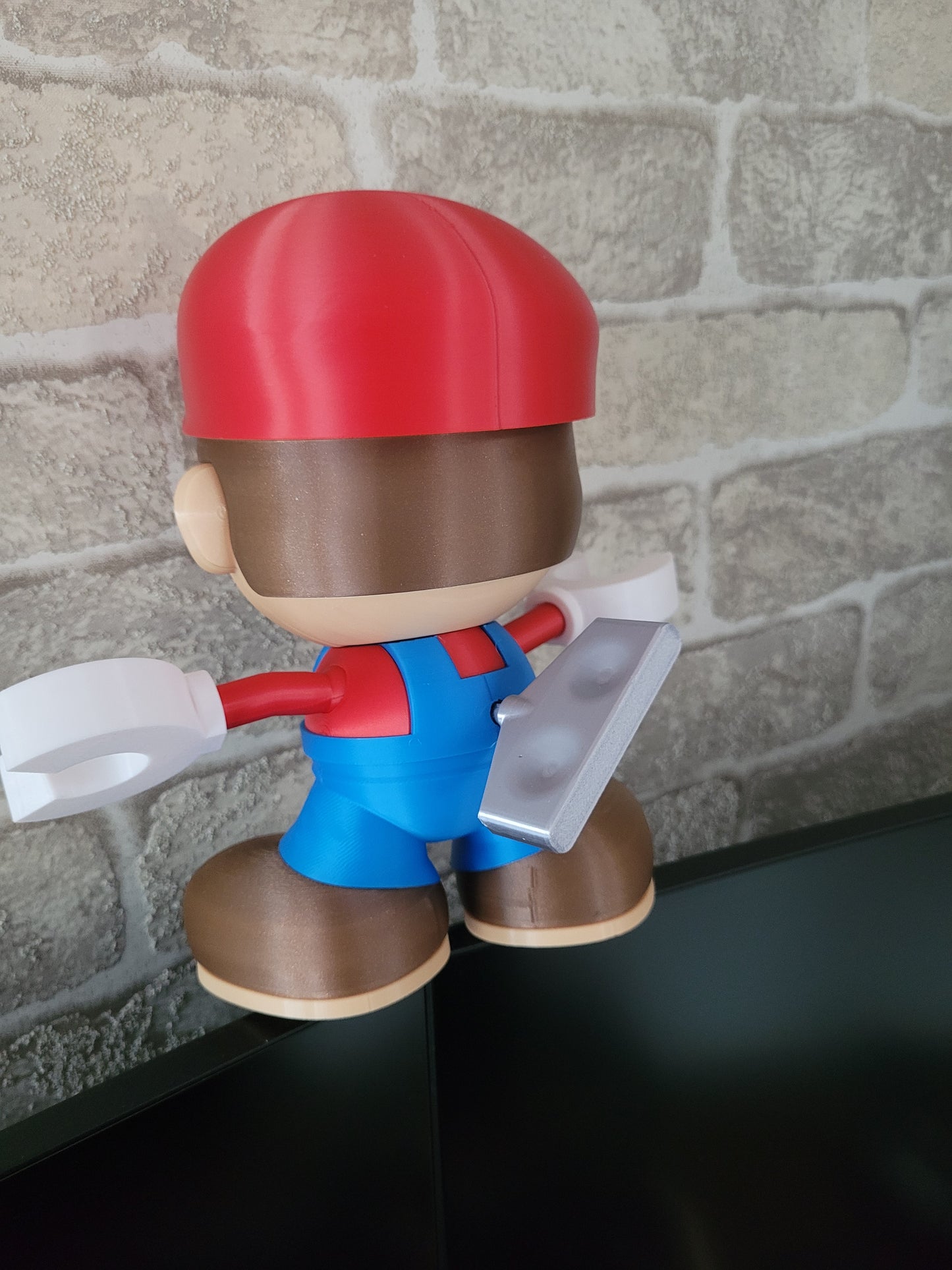 Impression 3D plombier rouge