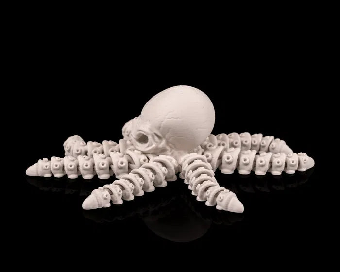 Squelette de pieuvre articulé en plastique noir, modèle Customcréa3D, avec plusieurs articulations pour la décoration ou la modélisation.