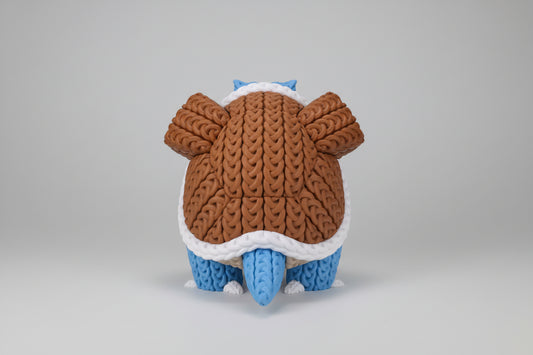 Tortue canon effet tricoté de la marque Customcréa3D, détail du motif tricoté sur la carapace et les membres colorés.