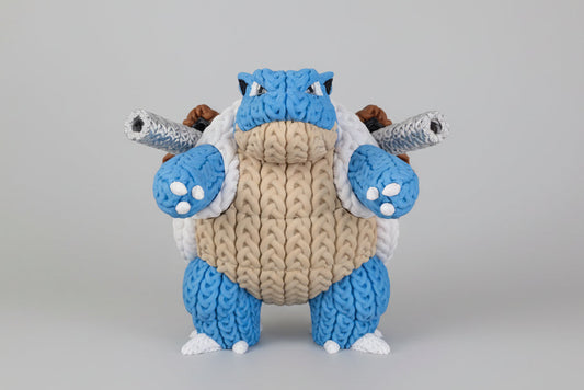 Tortue Canon effet tricoté de Customcréa3D, figurine en tissu avec détails tricotés, modèle décoratif pour collection ou intérieur.